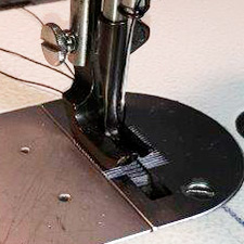 Walking foot sews thick material